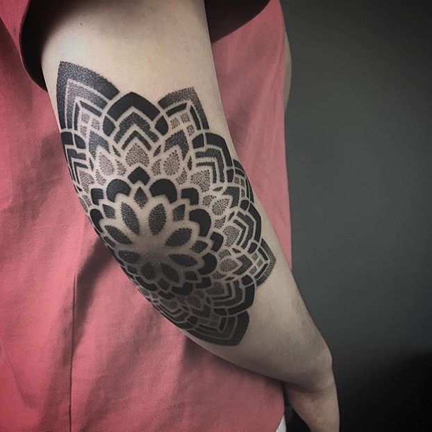 mandala elbow tattoo