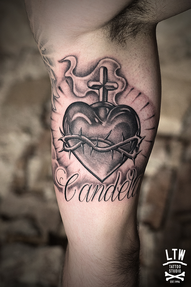 sagrado corazon tatuaje