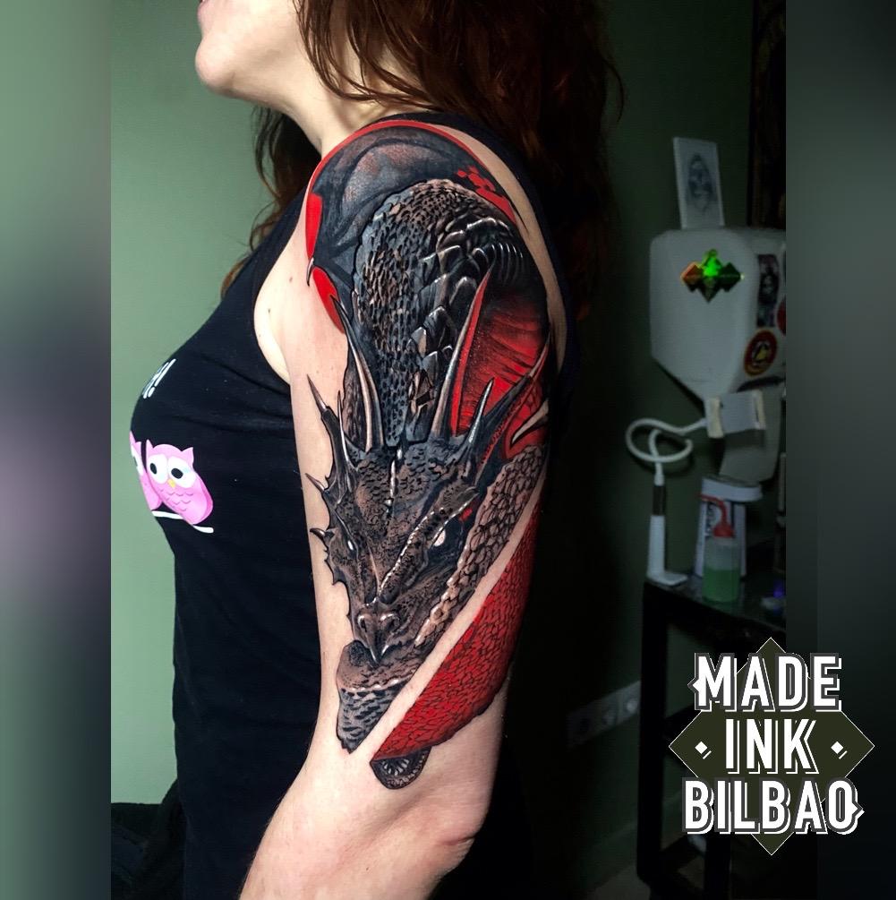 tatuajes de dragones en el brazo