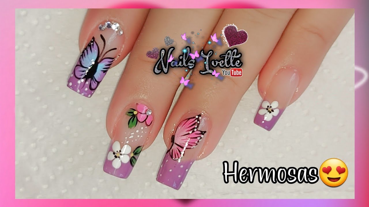 uñas decoradas con flores y mariposas