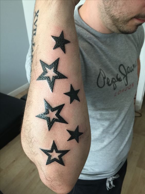 diseños de tatuajes de estrellas para hombres