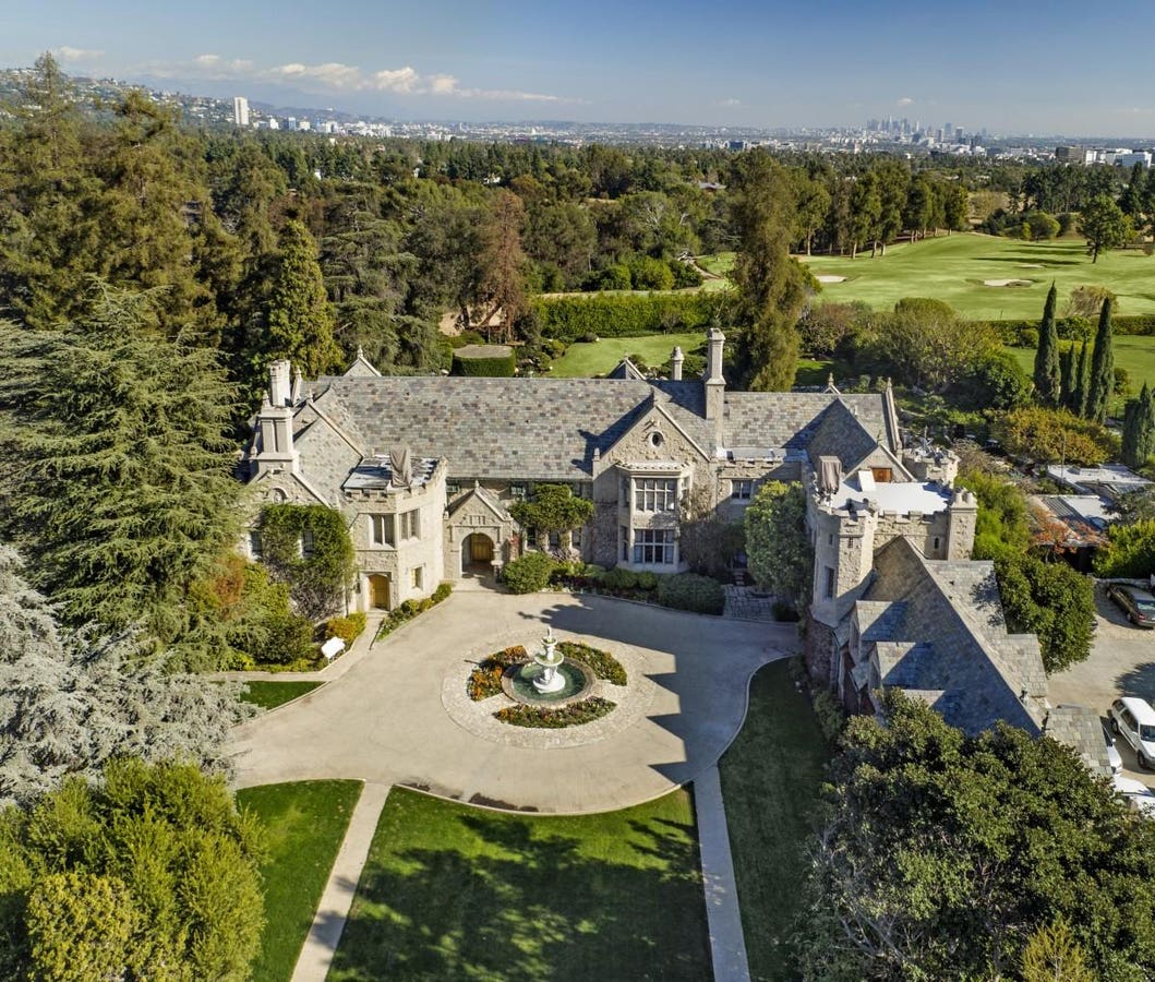 who owned playboy mansion