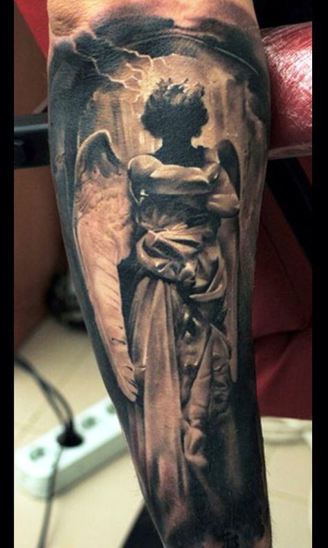 angel on forearm tattoo