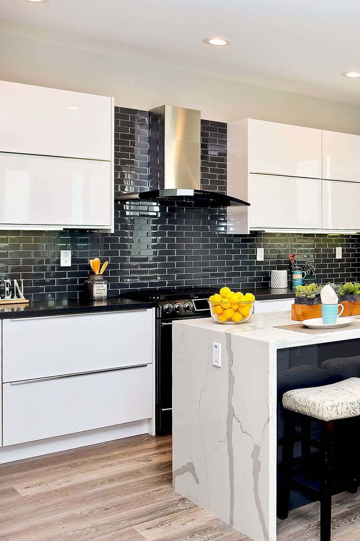 black subway tile backsplash