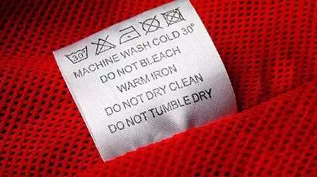 tumble dry low meaning in hindi