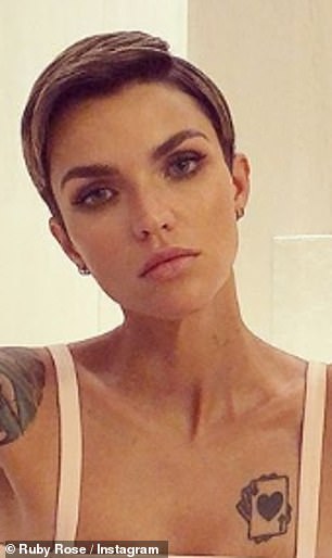 ruby rose neck tattoo