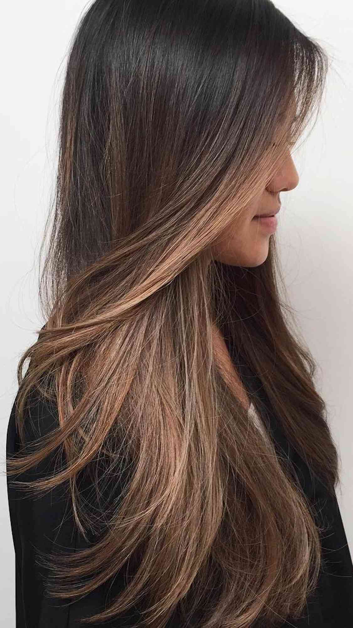 straight dark brown hair with highlights