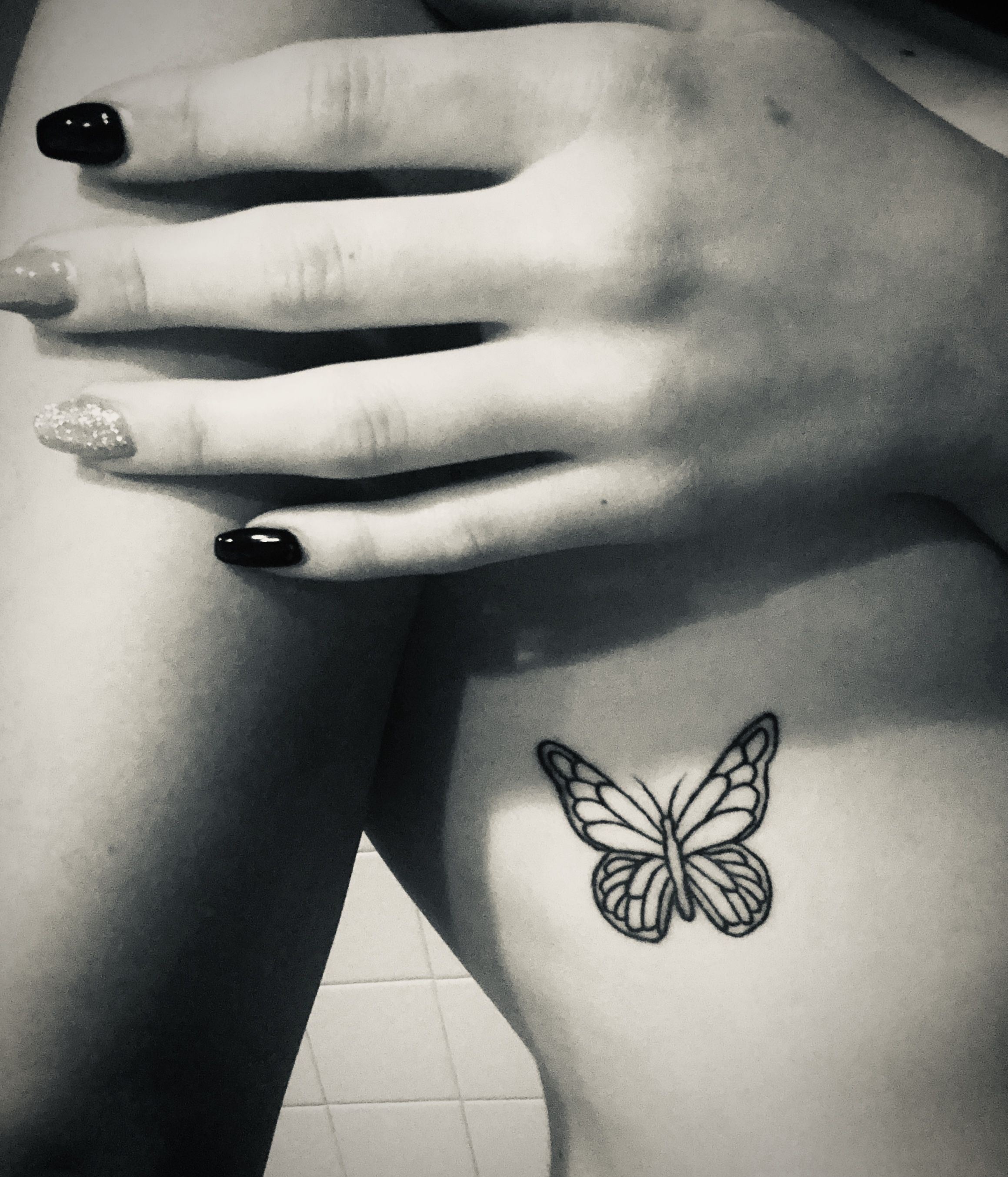 side boob tattoo butterfly