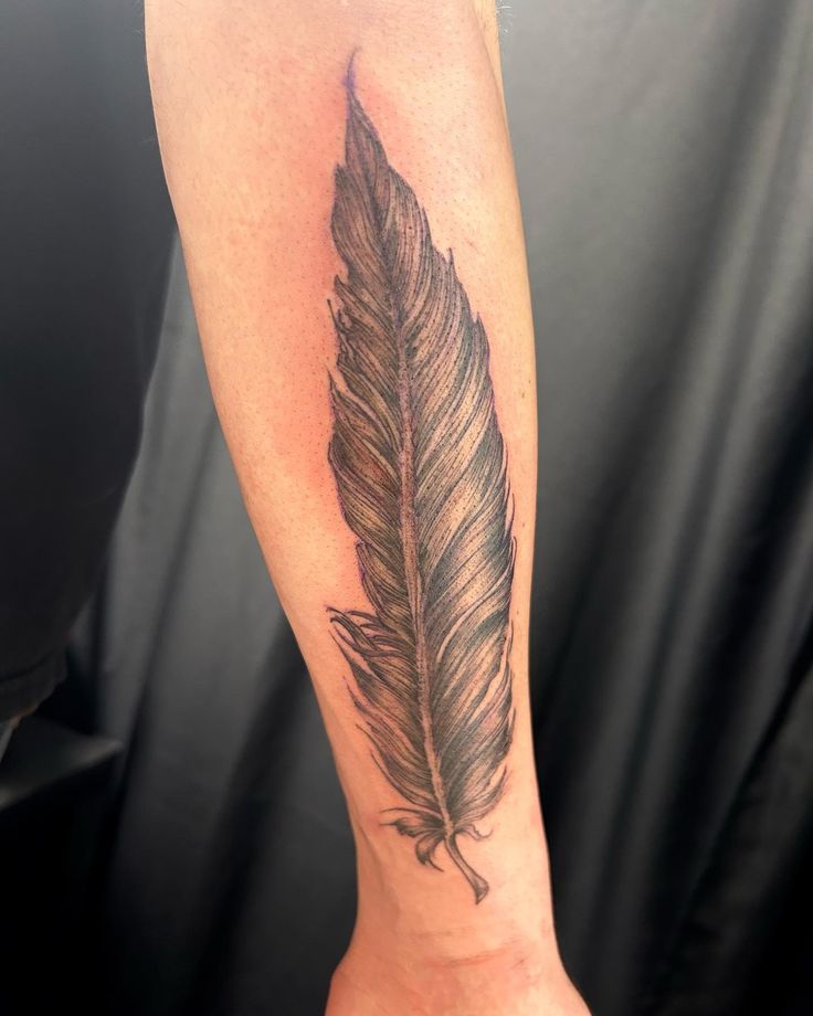 feather tattoo black and grey