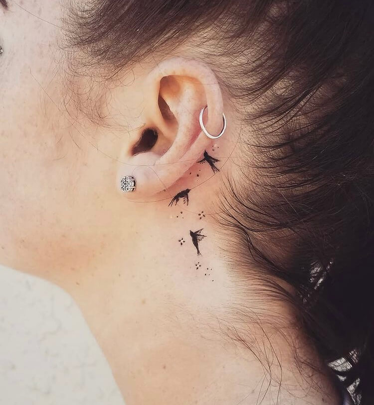 back of earlobe tattoo