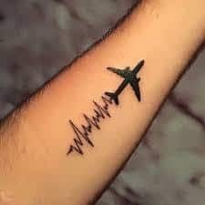 airplane tattoo on hand