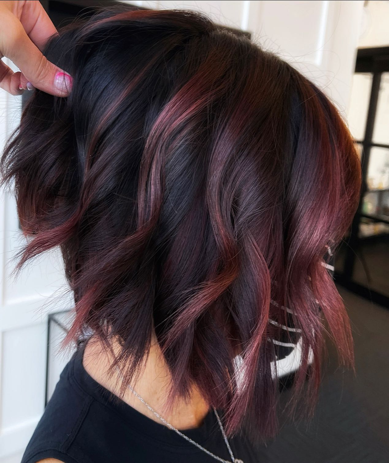 short burgundy hair with highlights