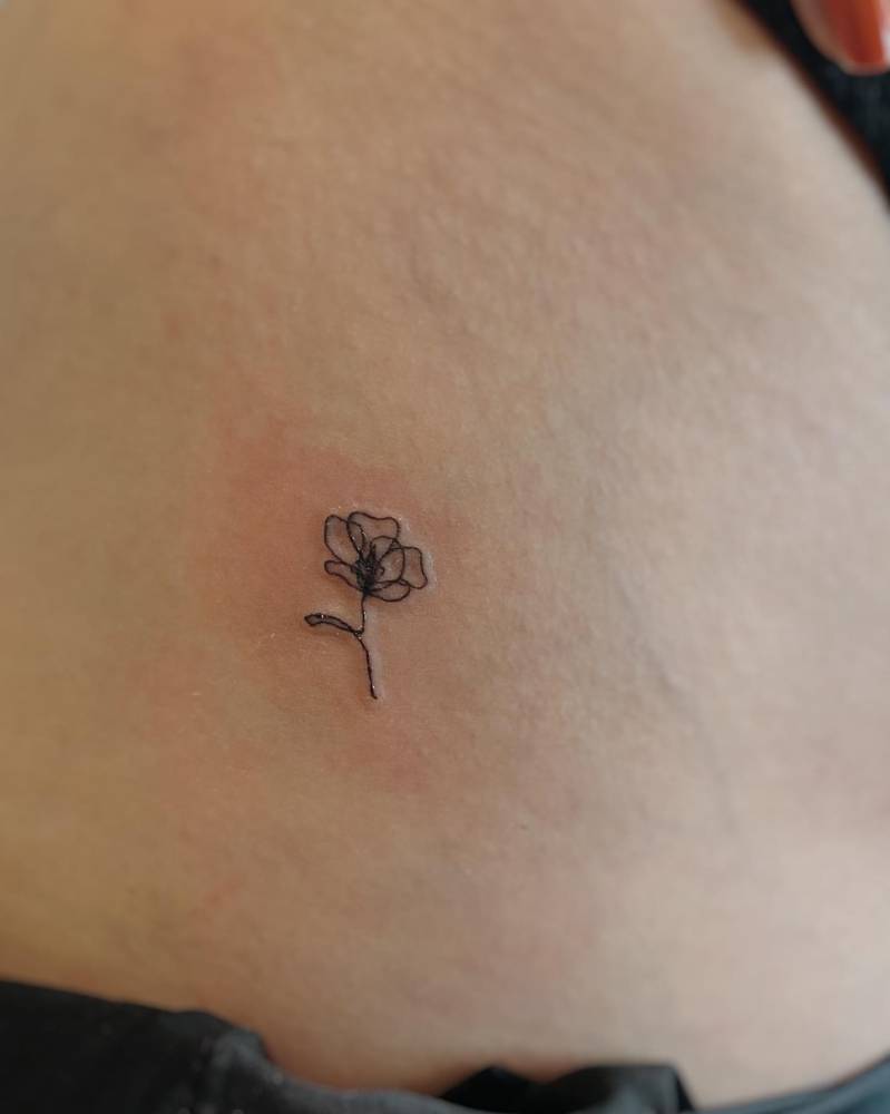 tiny poppy tattoo