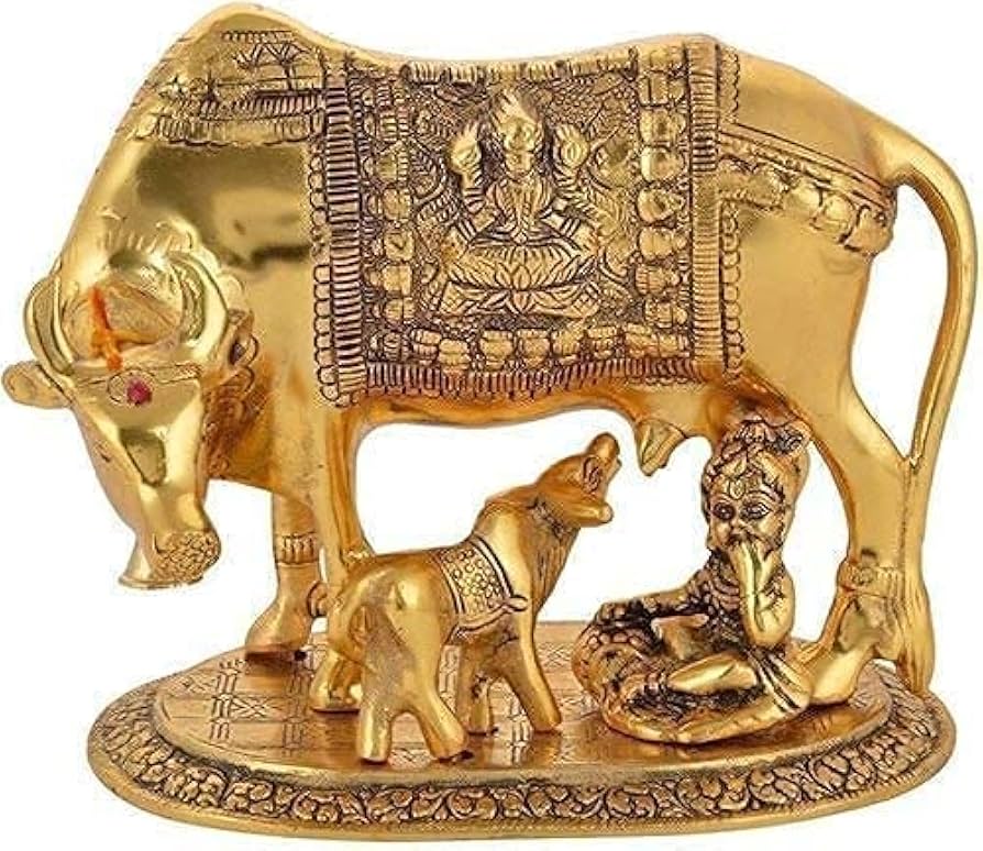 cow and calf statue in pooja room