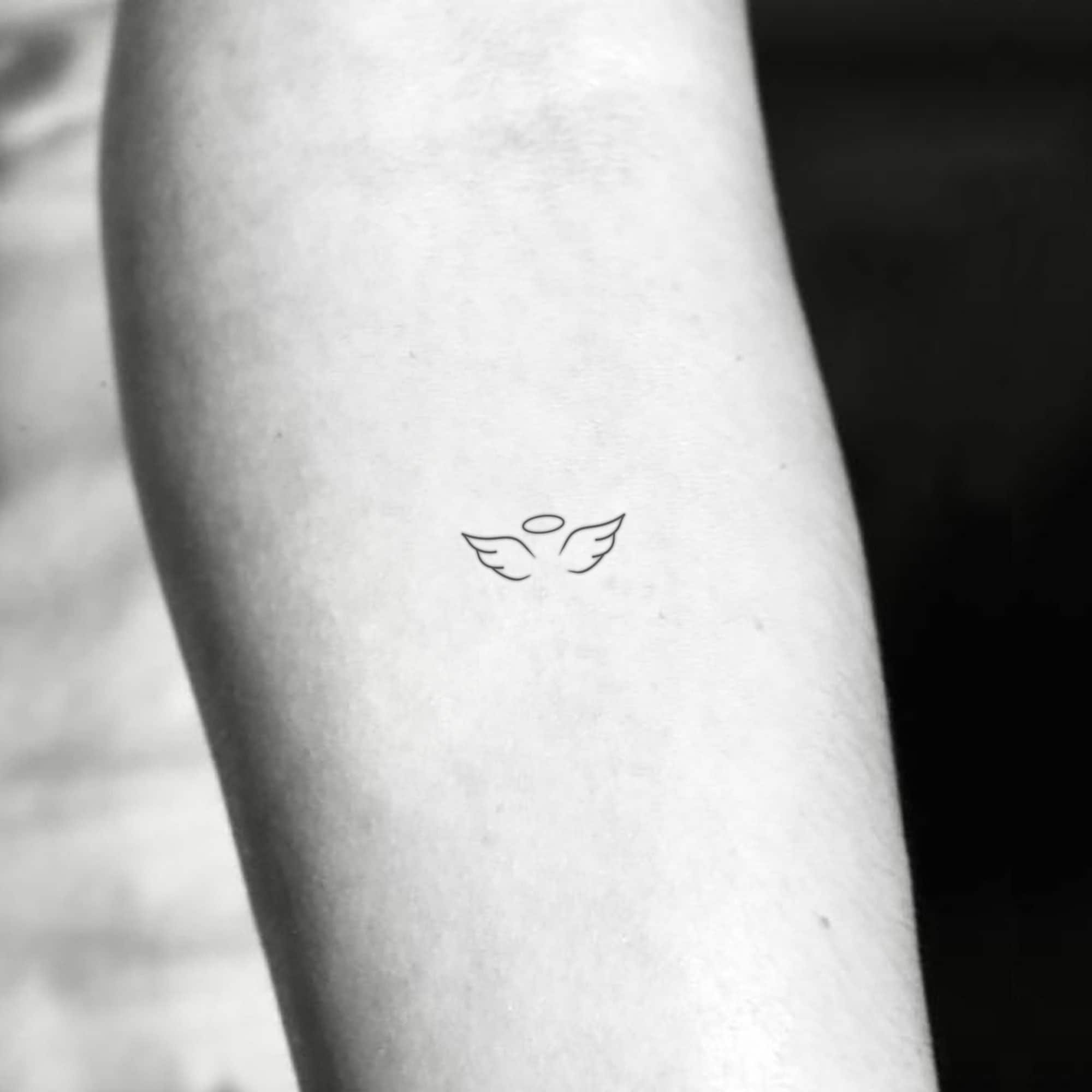 pequeño tatuajes de alas de angel