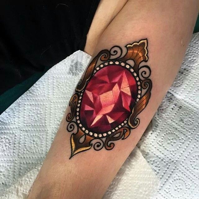 traditional gem tattoo