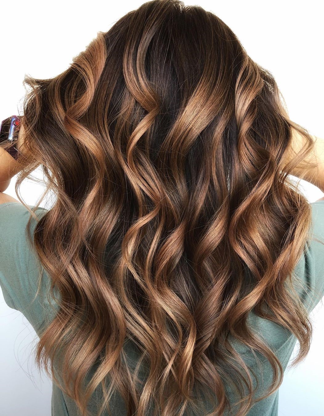 light brown balayage on dark hair