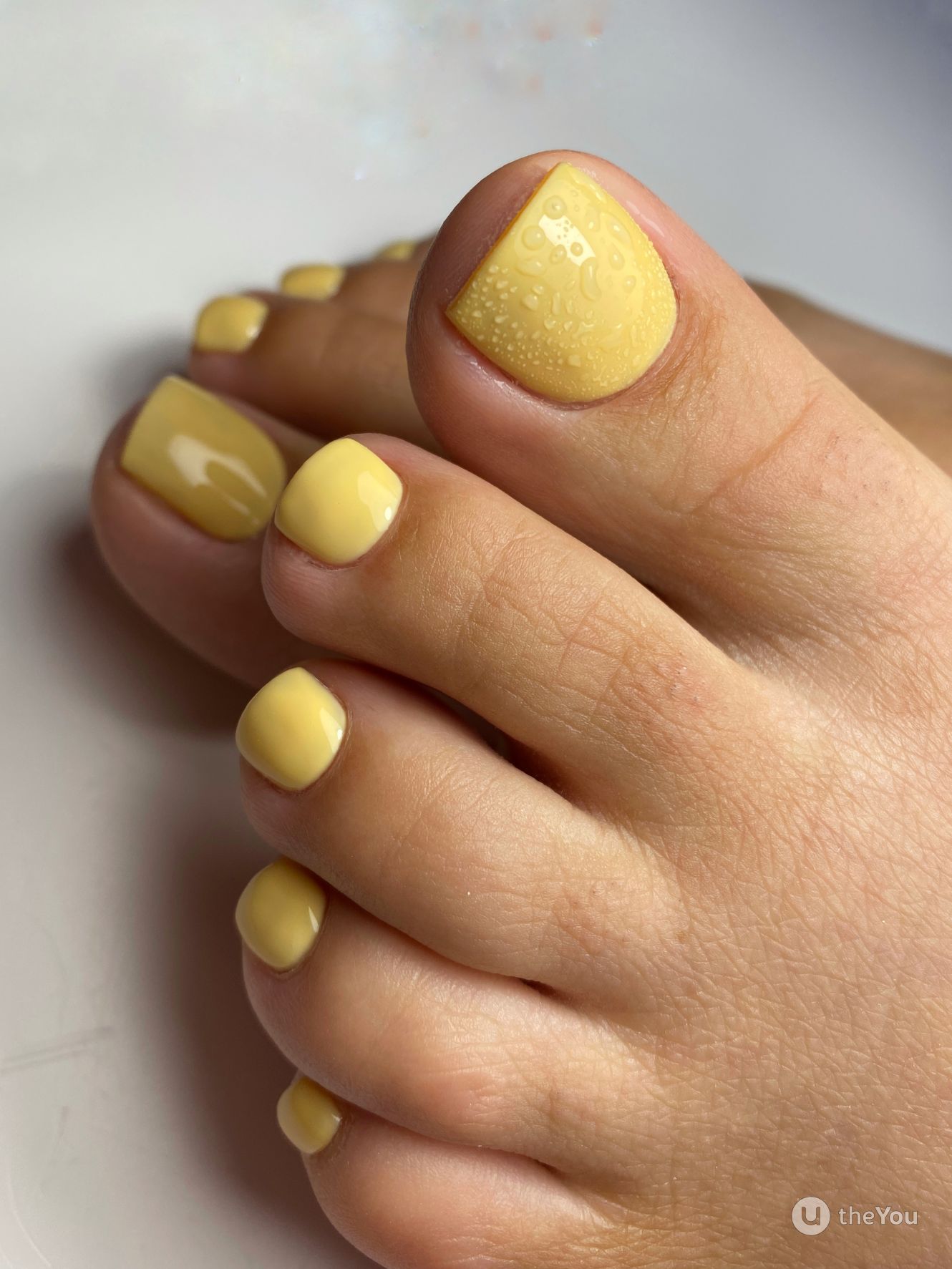 pastel yellow toenails