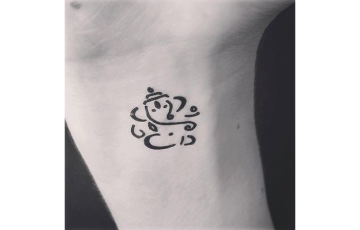 yoga tattoo minimalist