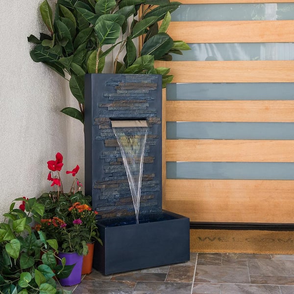 outdoor wall fountain with light