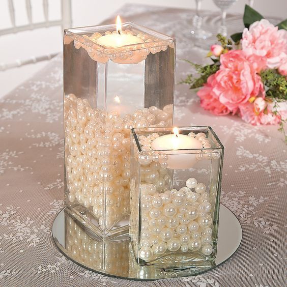 centros de mesa con velas flotantes