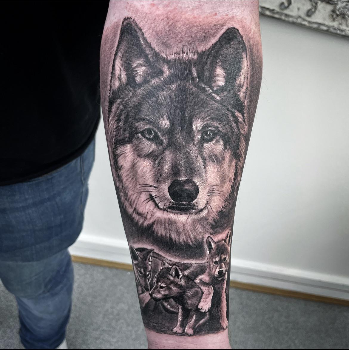 wolf and cub tattoo