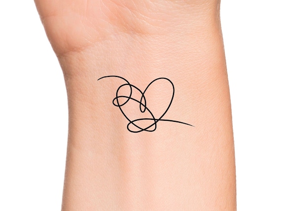 corazon de bts tatuaje