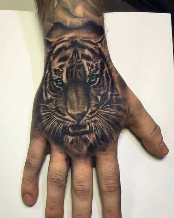 tiger face tattoo on hand