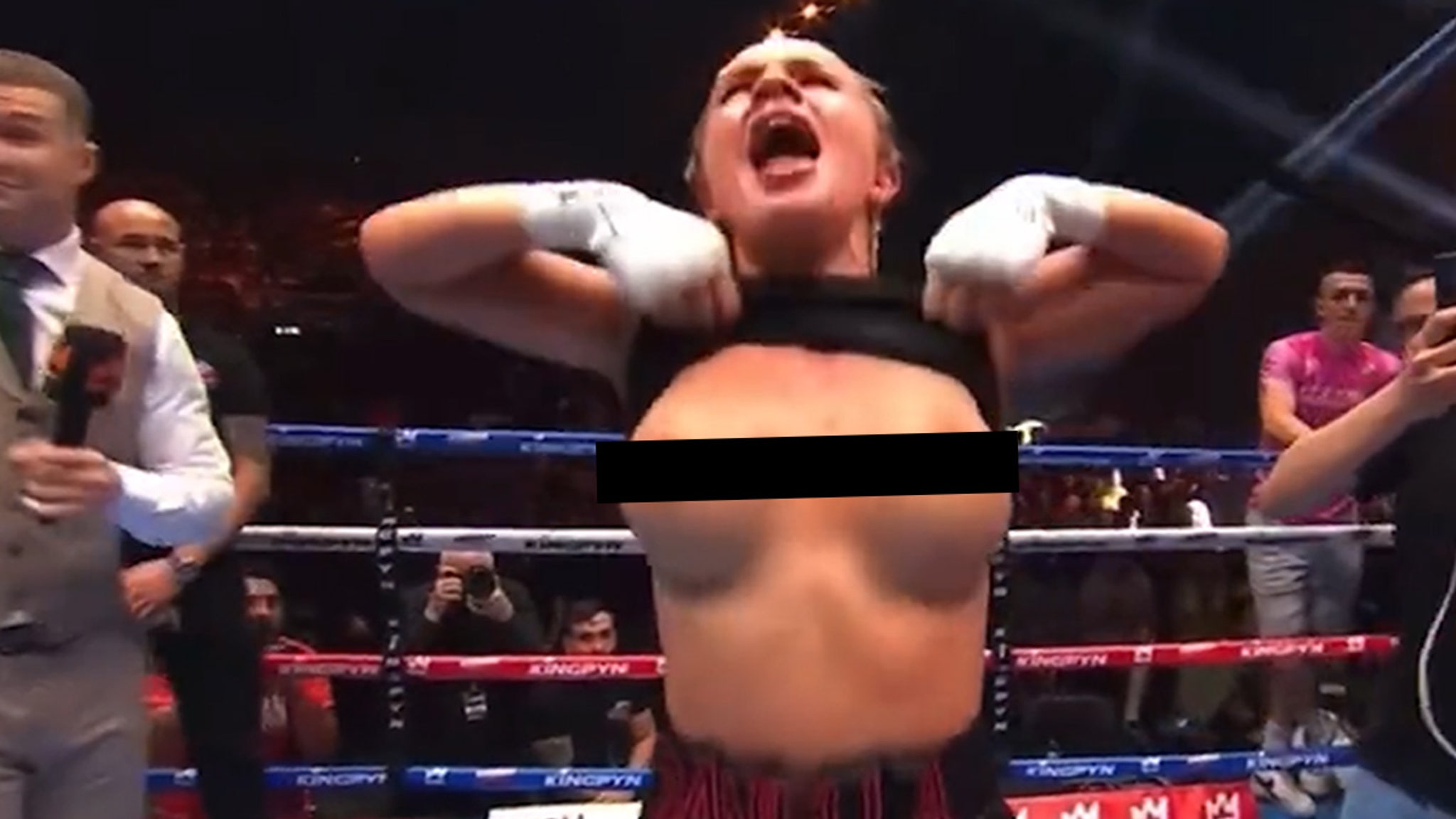 female boxer flashes boobs