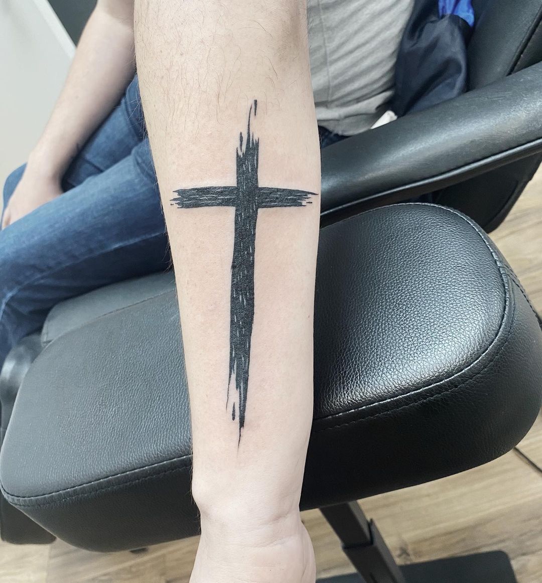 forearm cross tattoo