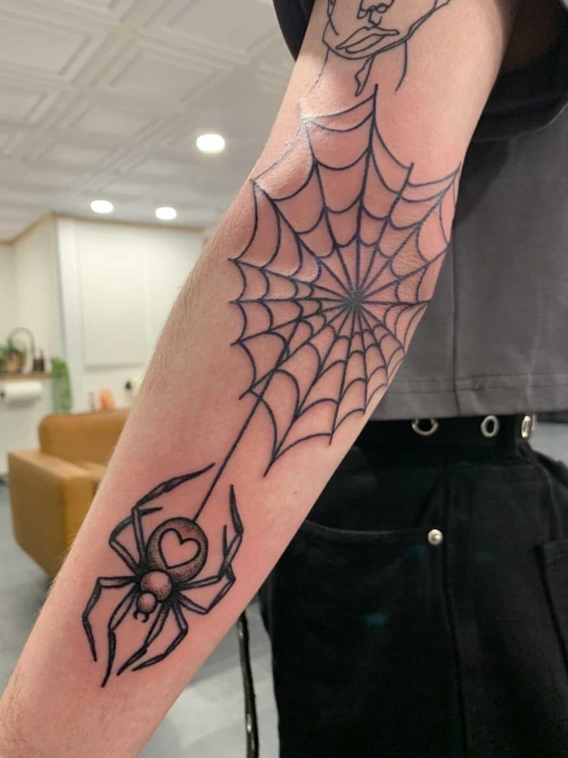 meaning of spider web on elbow