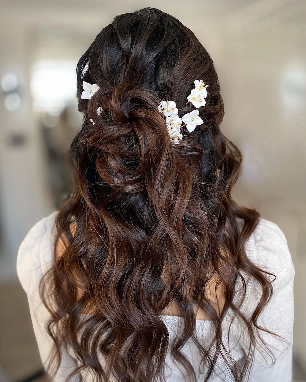 messy half up half down wedding