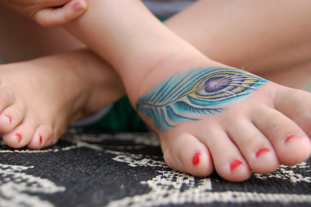 peacock foot tattoo