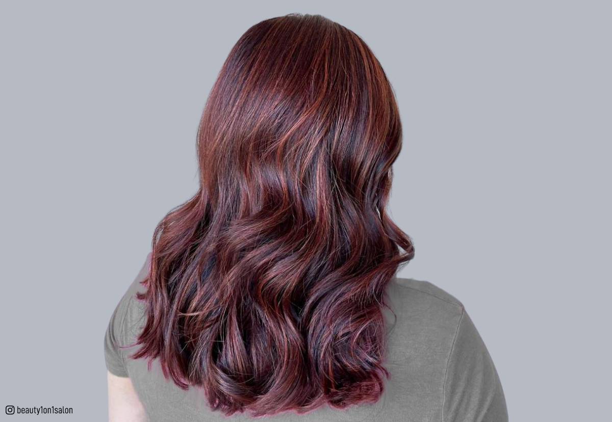 red and brown highlights in brown hair