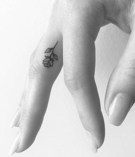 rose finger tattoo