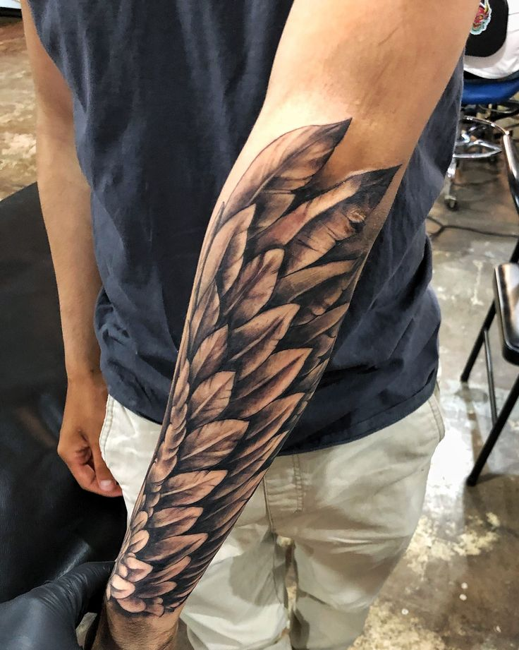 tattoo wings on arms