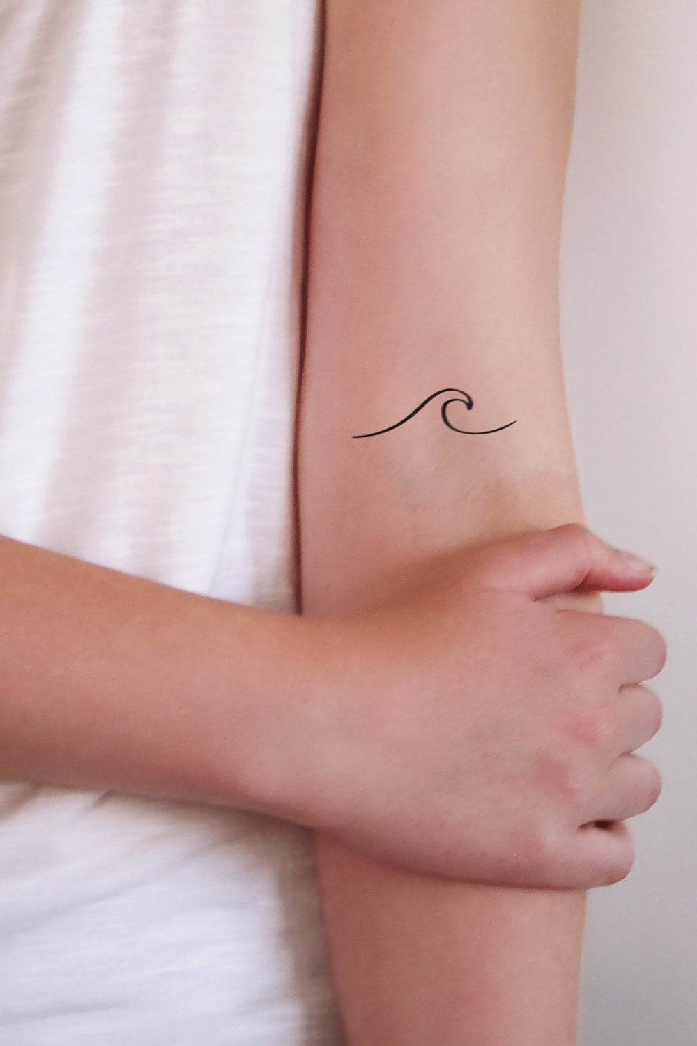 tatuajes de olas pequeños