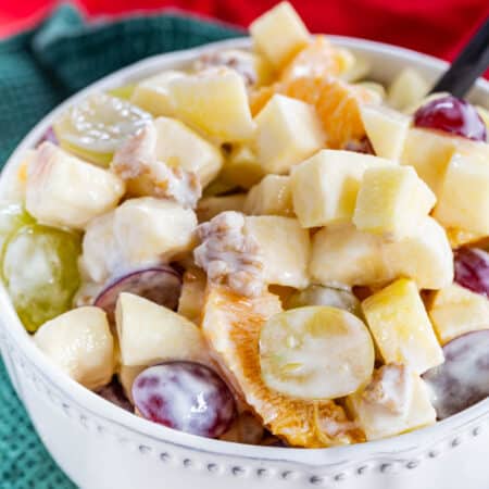 waldorf salad fruit crossword clue