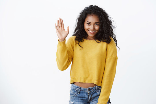 woman waving hello